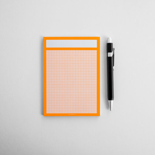 Neonfarbener Notitzblock Din A 6 mit Millimeterpapier-Raster